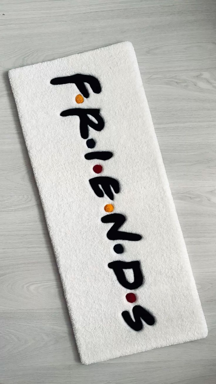 FRIENDS HAND-TUFTED RUG